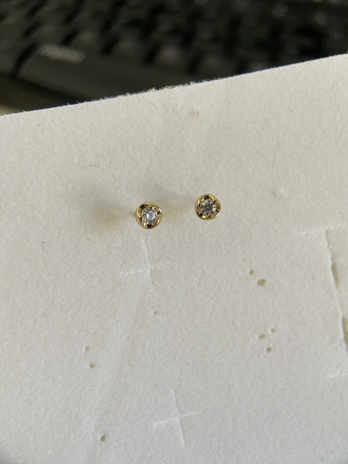 Actual product photo of 14K Solid Gold Bezel Floral Halo Stud Earrings, reference view 1