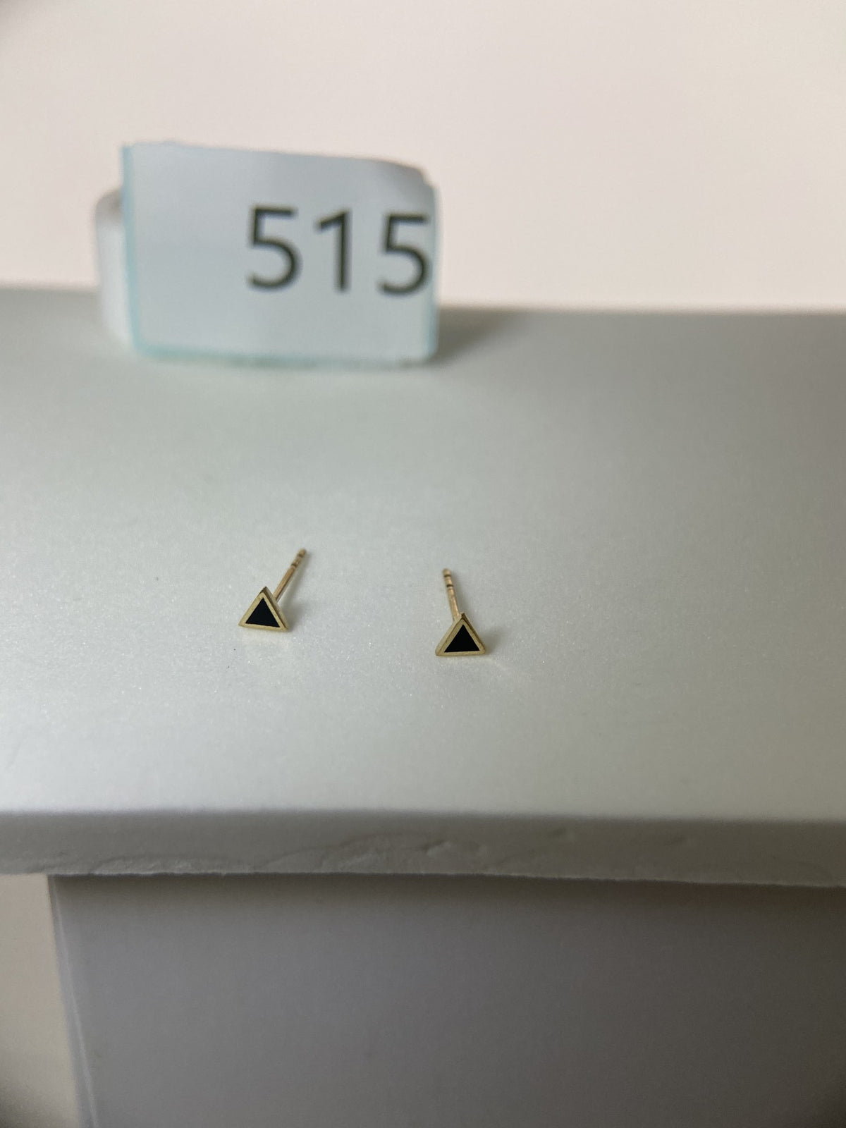 Actual product photo of 14K Solid Gold Black Triangle Stud Earrings, reference view 1