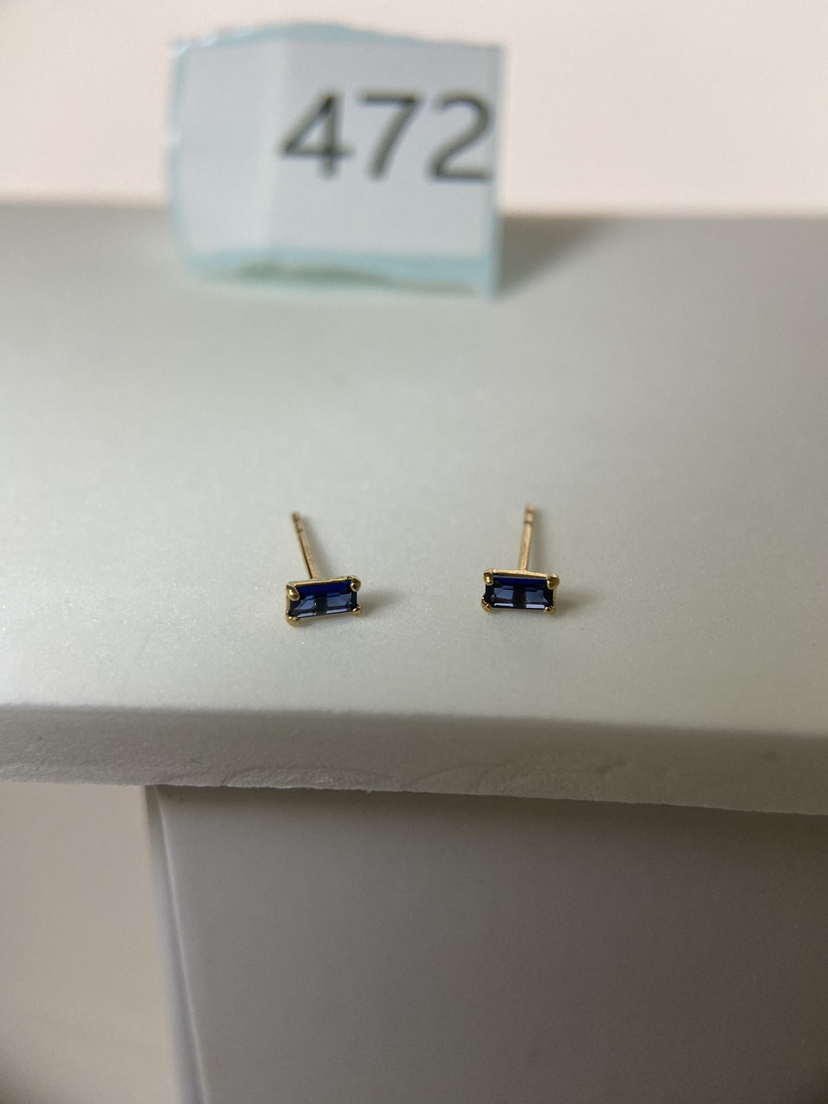 Actual product photo of 14K Solid Gold Blue Emerald Cut Stud Earrings, reference view 1