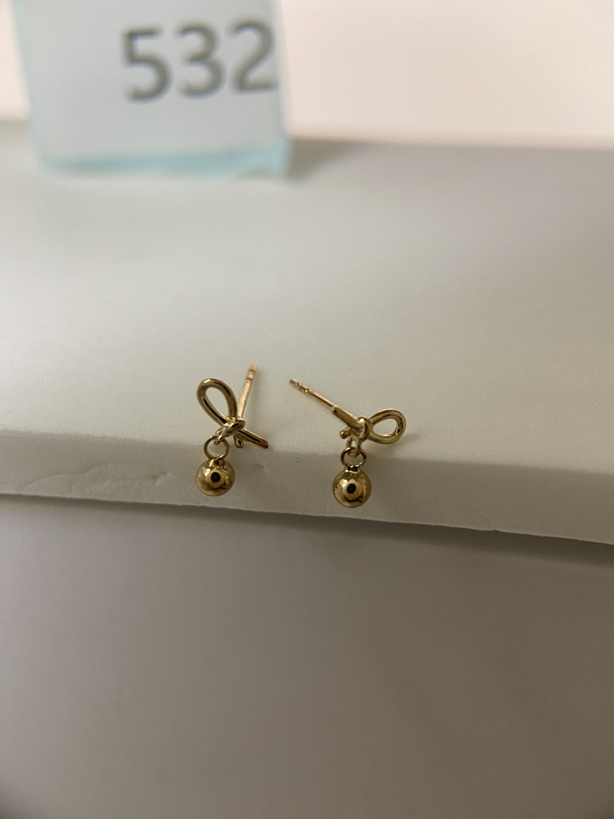 Actual product photo of 14K Solid Gold Bow Ball Drop Stud Earrings, reference view 1