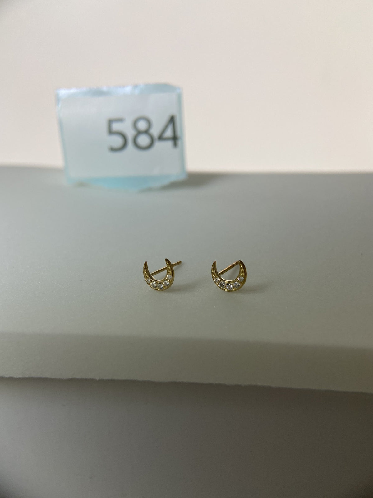 Actual product photo of 14K Solid Gold Crescent Crystal Halo Stud Earrings, reference view 1