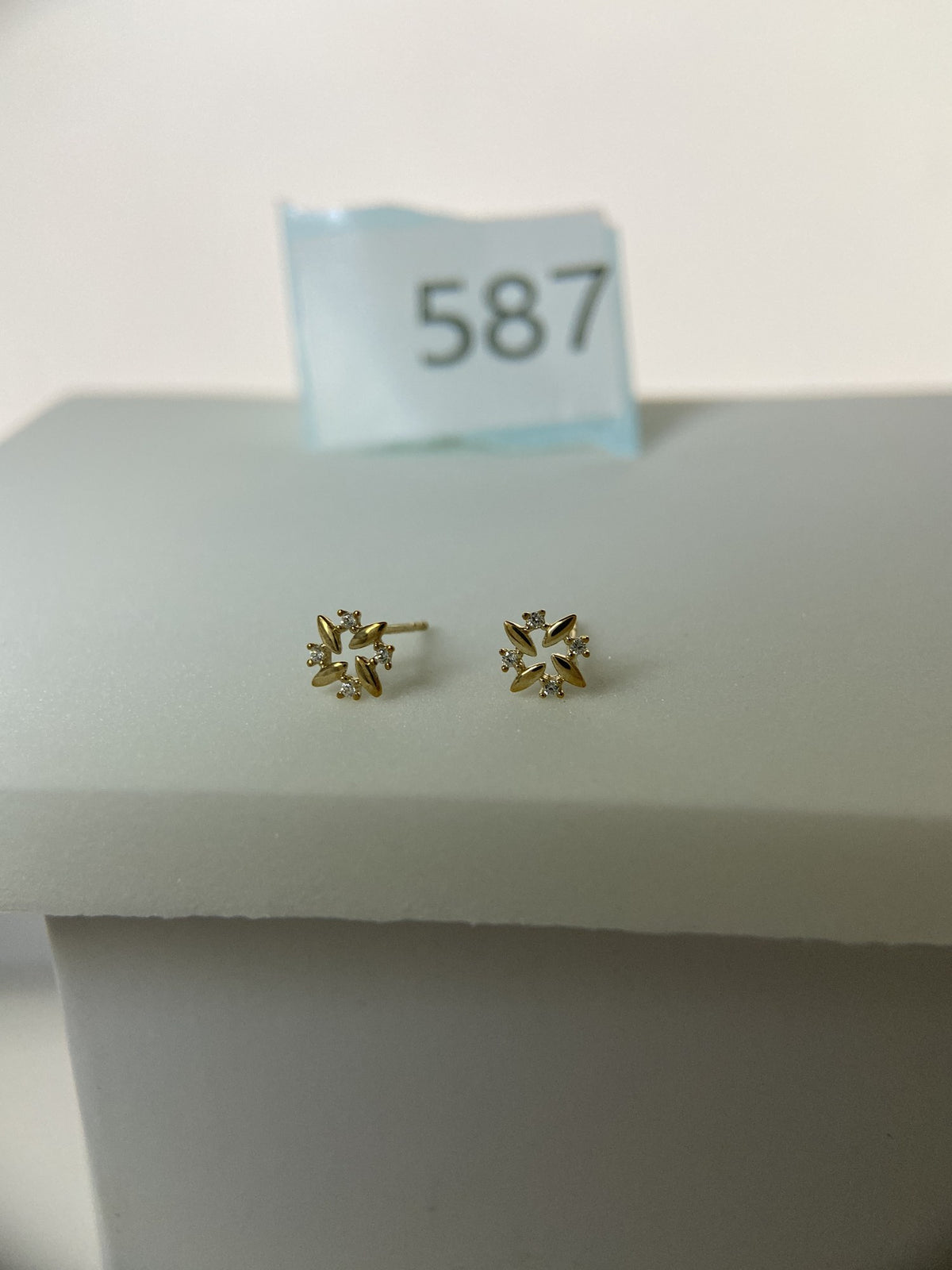 Actual product photo of 14K Solid Gold Crystal Pinwheel Flower Stud Earrings, reference view 1