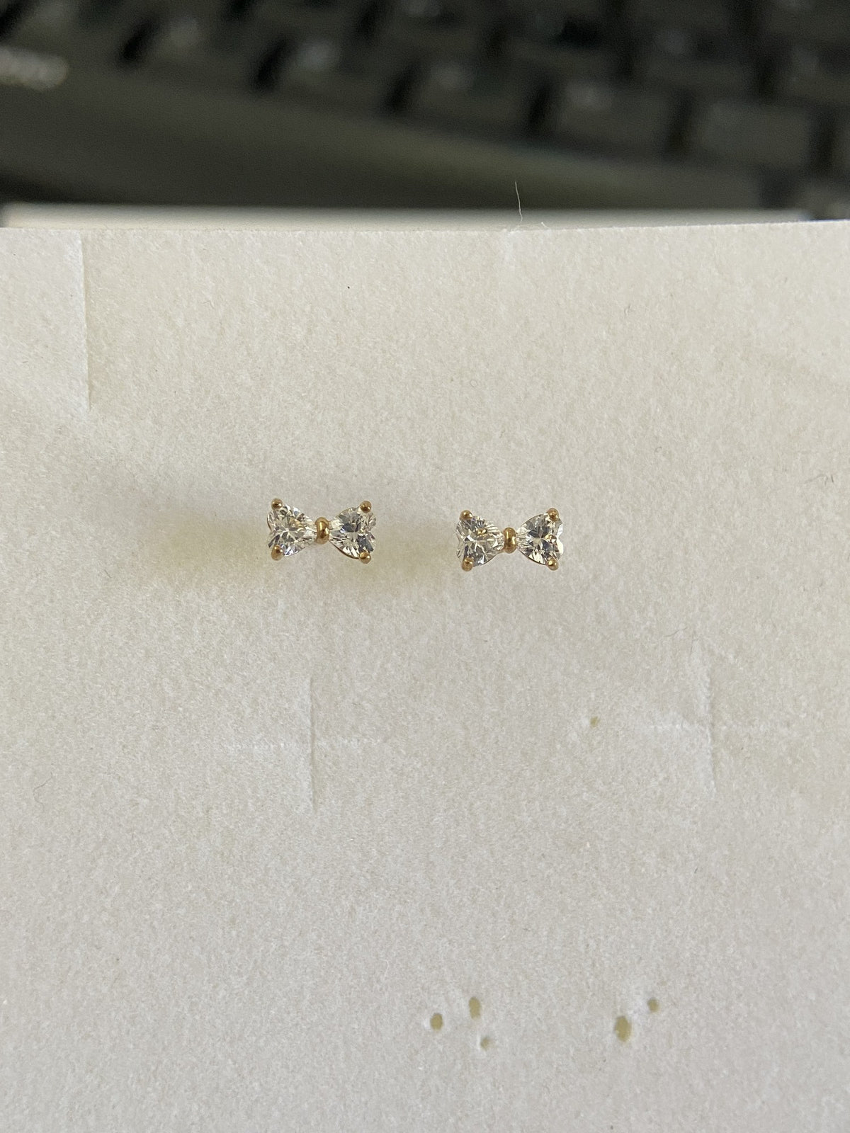 Actual product photo of 14K Solid Gold Crystal Ribbon Bow Stud Earrings, reference view 1