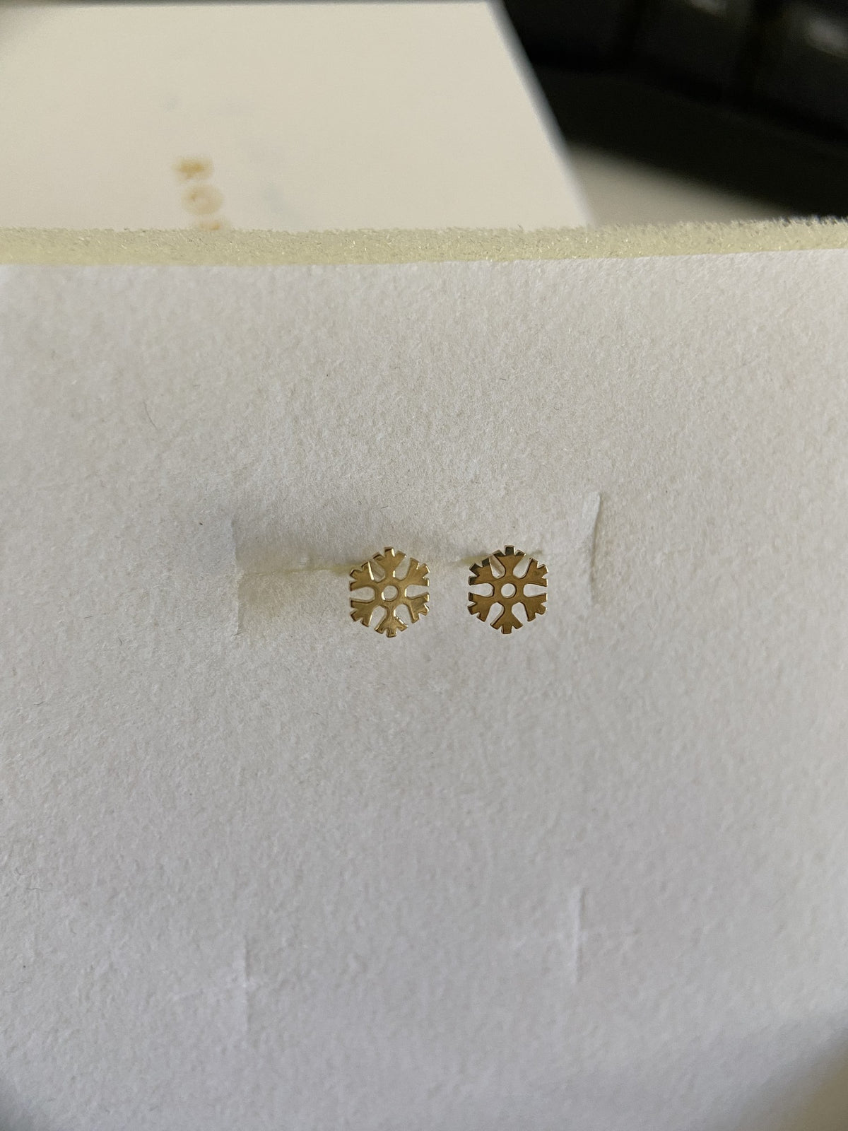 Actual product photo of 14K Solid Gold Cutout Snowflake Stud Earrings, reference view 1