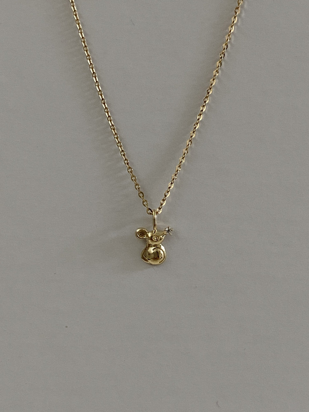 Actual product photo of 14K Solid Gold Floral Mouse Pendant, reference view 2