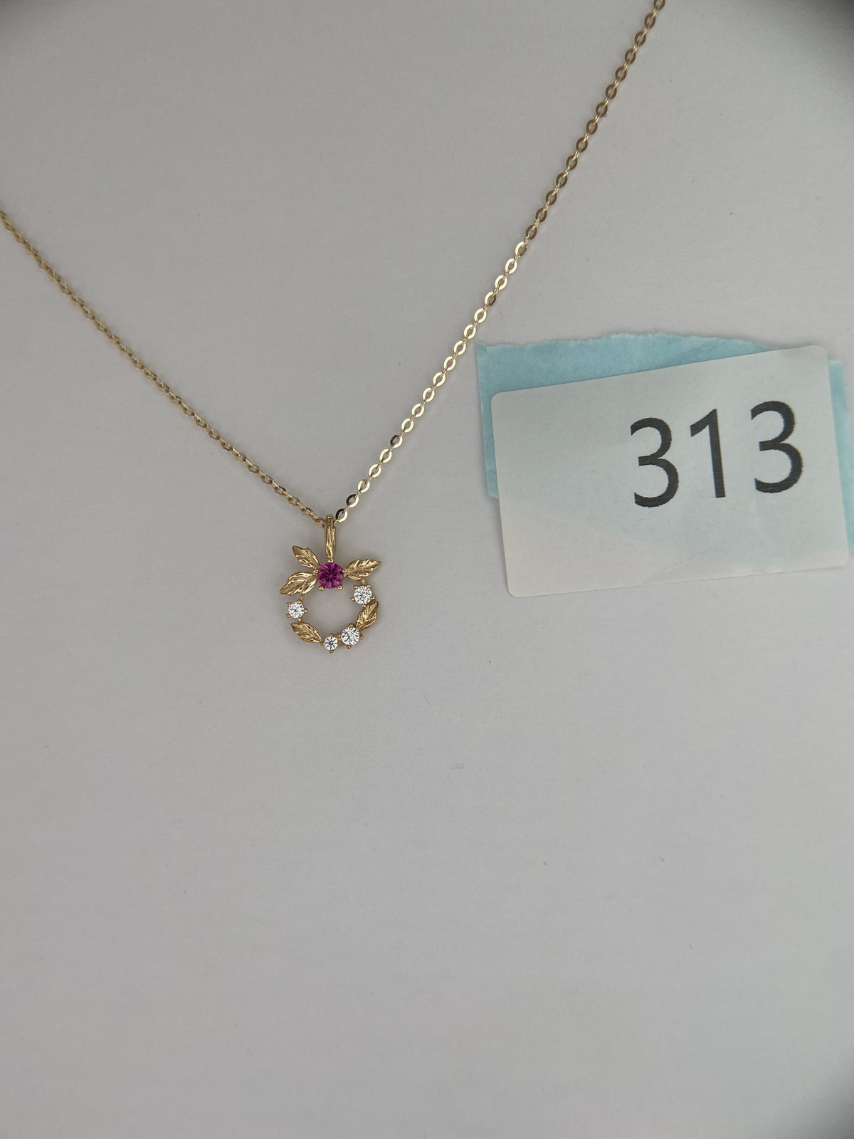 Actual product photo of 14K Solid Gold Floral Wreath Pendant, reference view 1