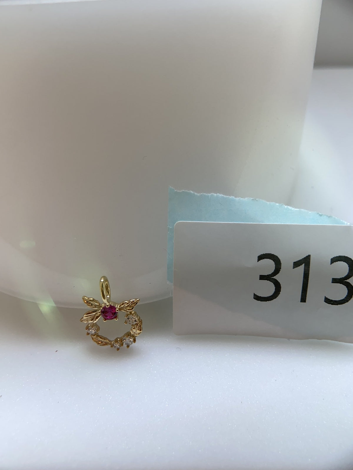 Actual product photo of 14K Solid Gold Floral Wreath Pendant, reference view 2