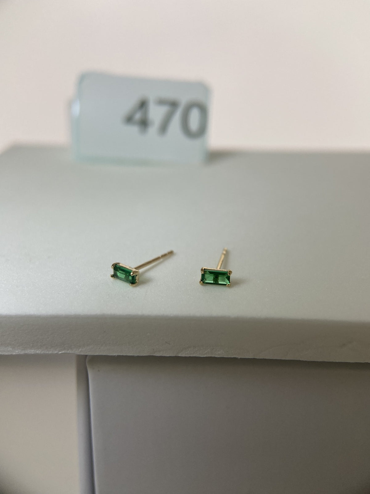Actual product photo of 14K Solid Gold Green Emerald Cut Stud Earrings, reference view 1