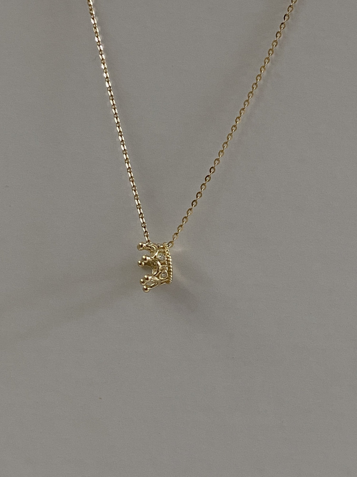 Actual product photo of 14K Solid Gold Moissanite Crown Pendant, reference view 2