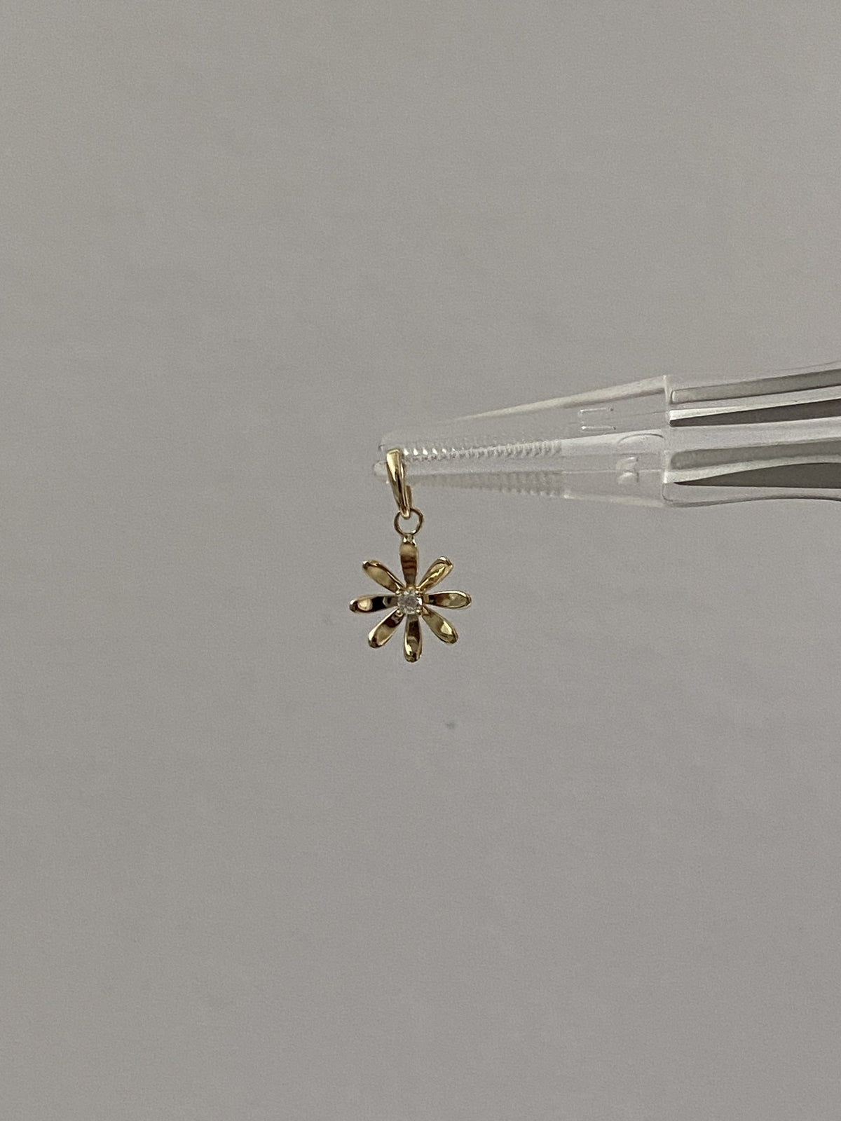 Actual product photo of 14K Solid Gold Moissanite Daisy Pendant, reference view 1