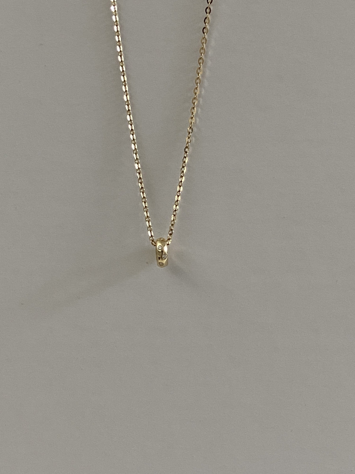 Actual product photo of 14K Solid Gold Moissanite Oval Ring Pendant, reference view 2