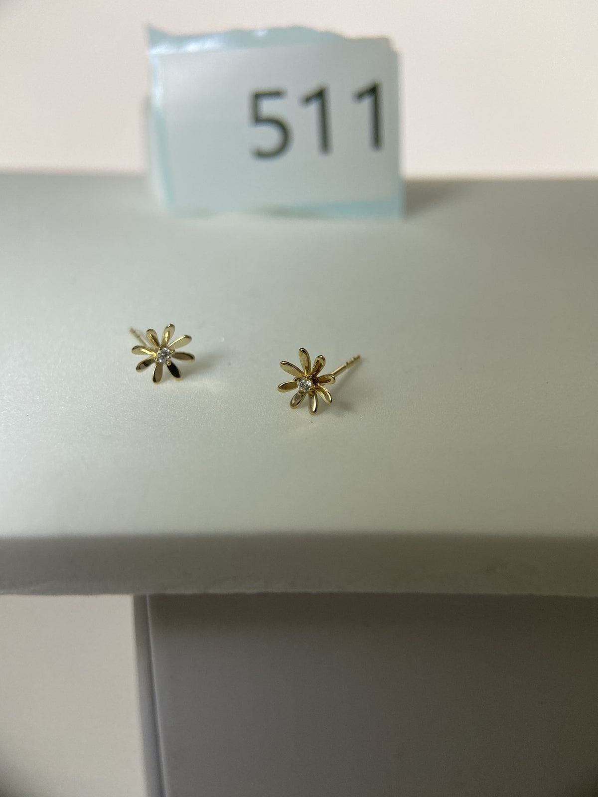 Actual product photo of 14K Solid Gold Open Daisy Stud Earrings, reference view 1