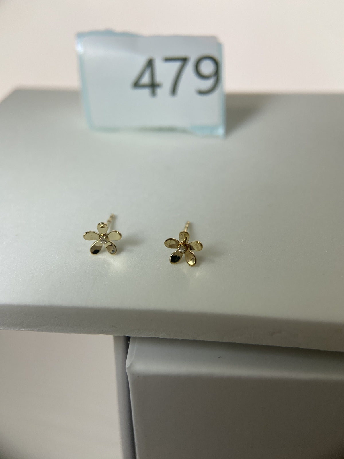 Actual product photo of 14K Solid Gold Open Petal Flower Stud Earrings, reference view 1
