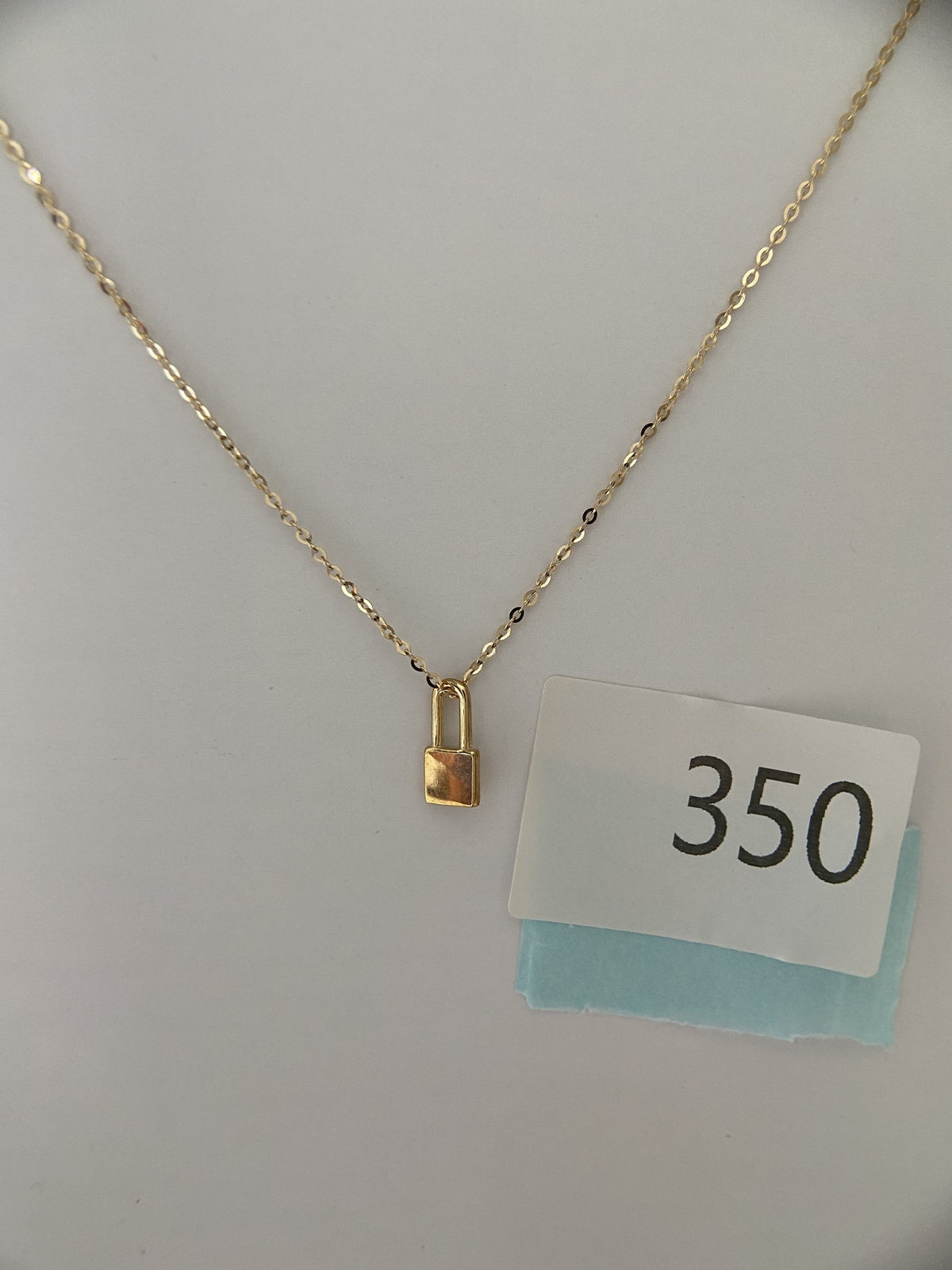 Actual product photo of 14K Solid Gold Padlock Pendant, reference view 2