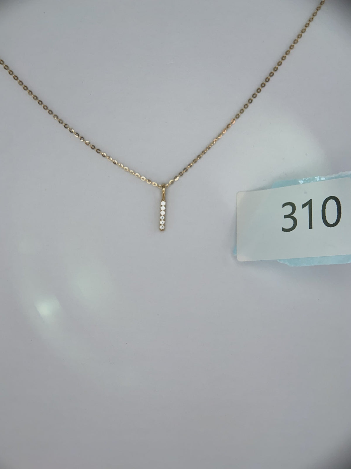 Actual product photo of 14K Solid Gold Pavé Bar Pendant, reference view 2