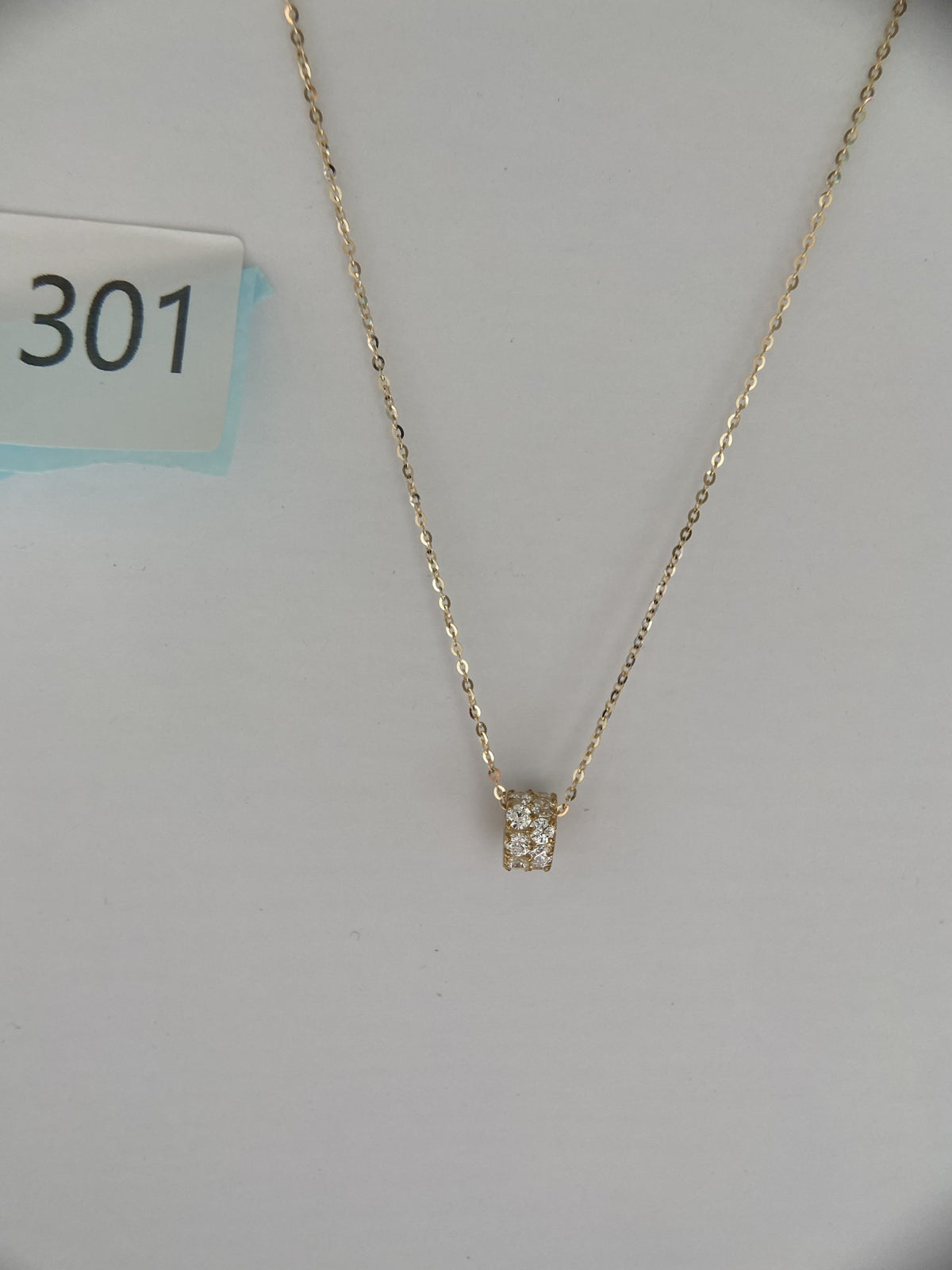 Actual product photo of 14K Solid Gold Pavé Barrel Charm Pendant, reference view 2