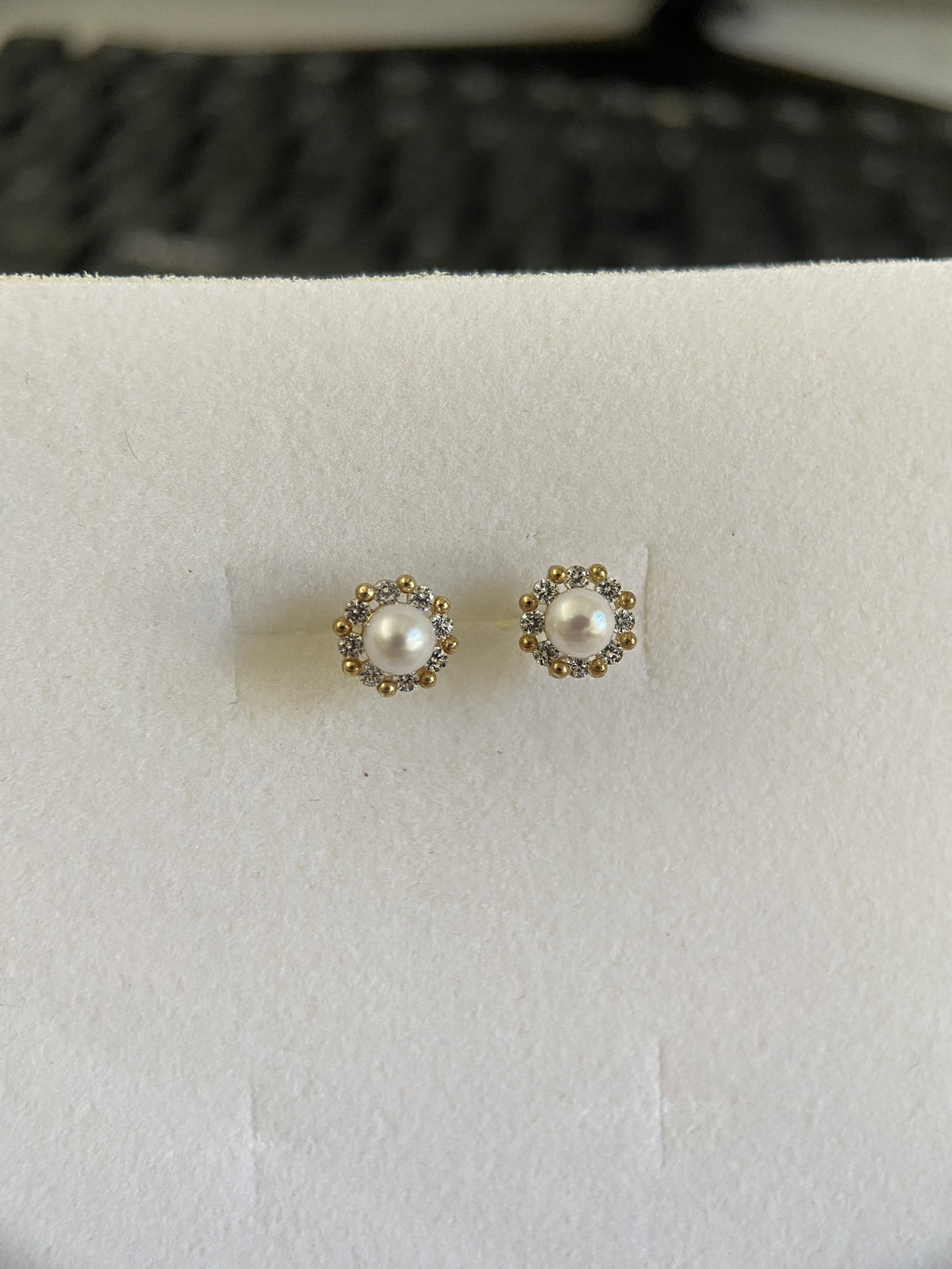 Actual product photo of 14K Solid Gold Pearl Floral Halo Stud Earrings, reference view 1