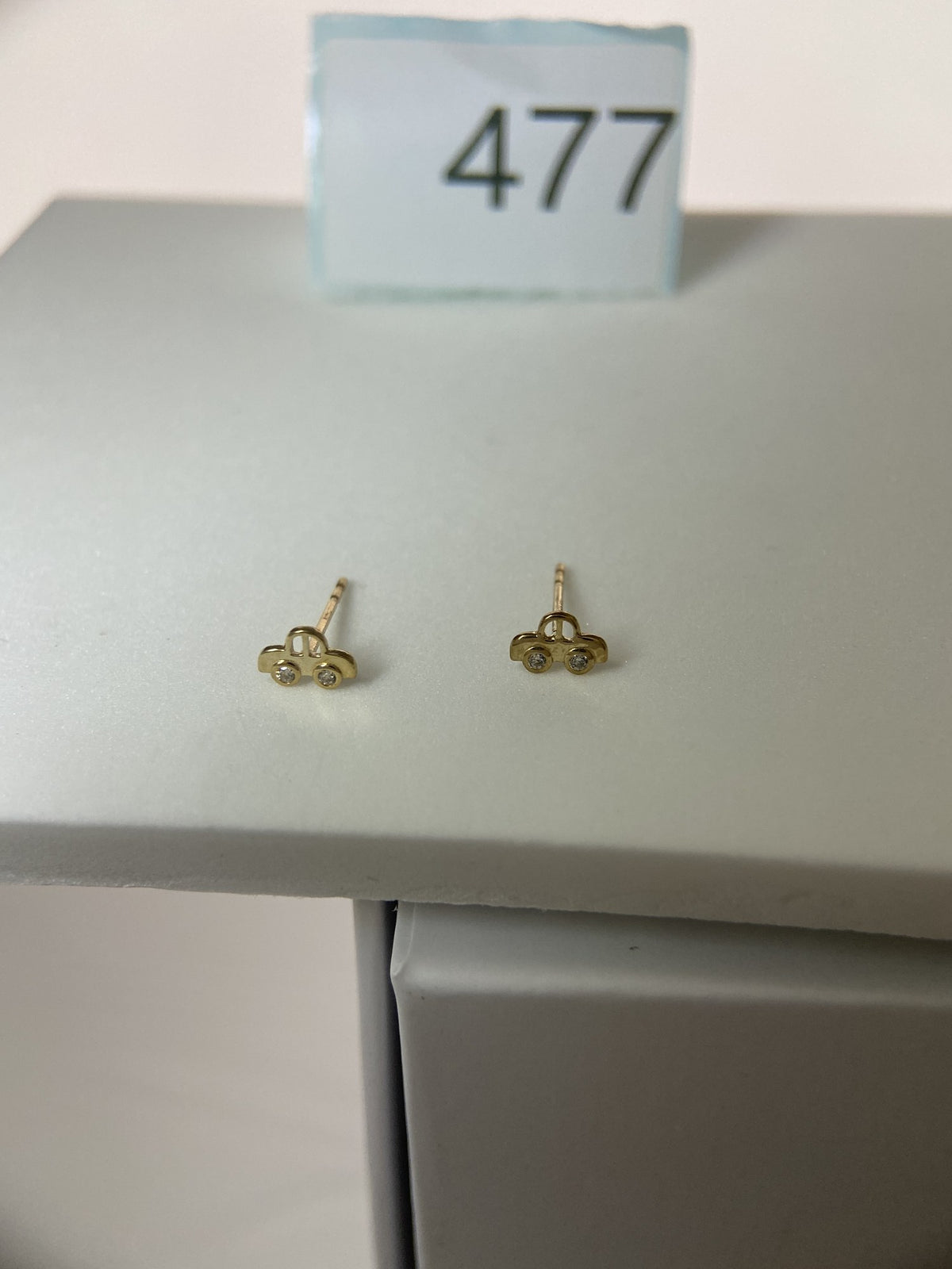 Actual product photo of 14K Solid Gold Playful Car Stud Earrings, reference view 1