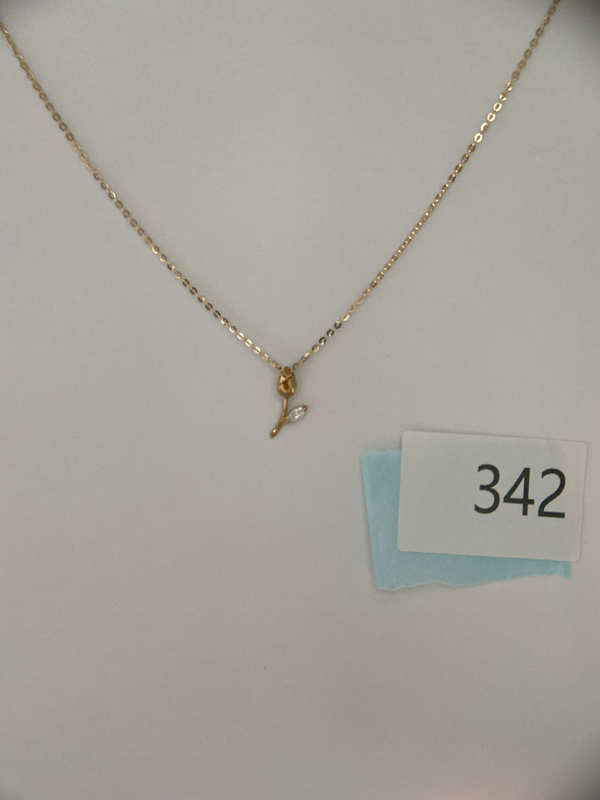 Actual product photo of 14K Solid Gold Rosebud Pendant, reference view 2