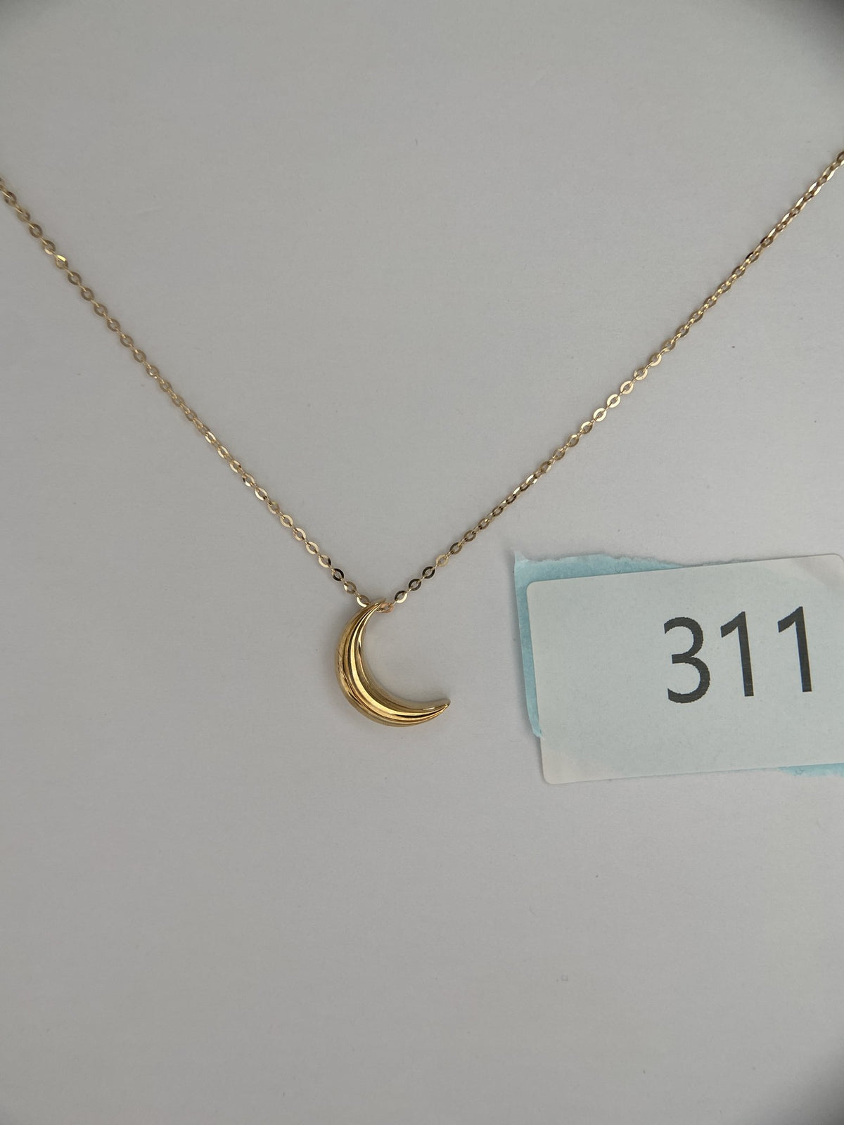 Actual product photo of 14K Solid Gold Sculpted Crescent Moon Pendant, reference view 2