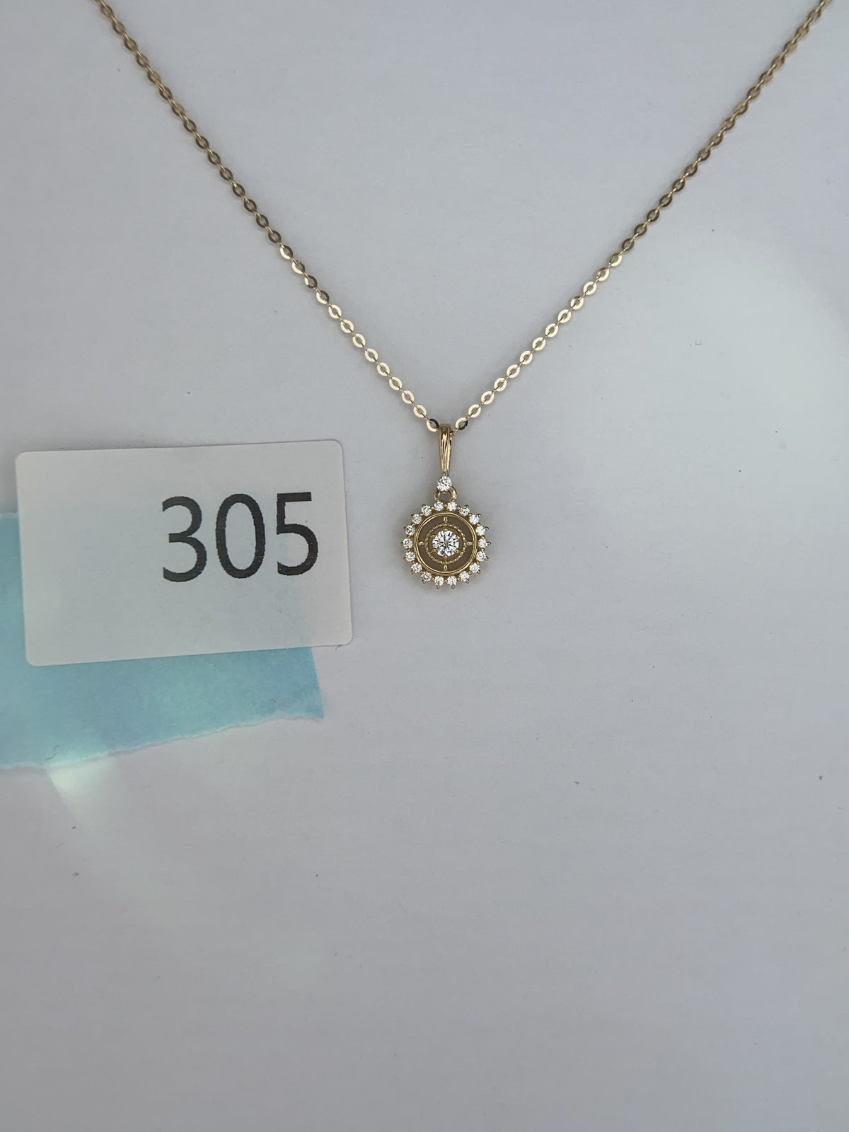 Actual product photo of 14K Solid Gold Sunburst Halo Pendant, reference view 2