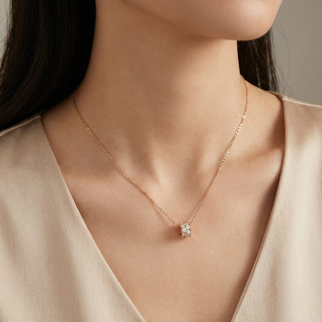 14K solid gold pavé barrel charm pendant worn on a fine chain