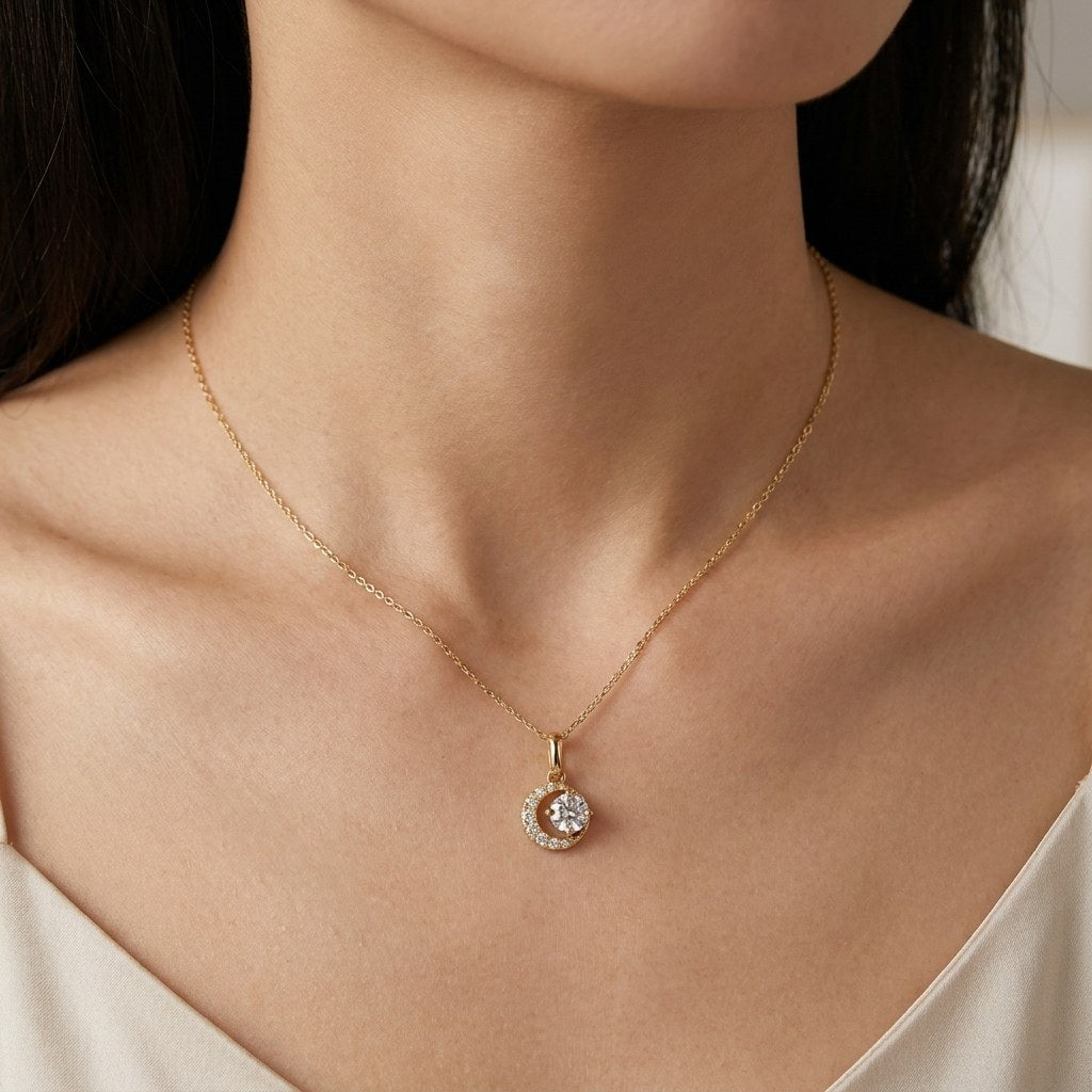 14K solid gold crescent halo pendant worn on a fine chain