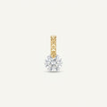14K solid gold solitaire drop pendant on a warm ivory background