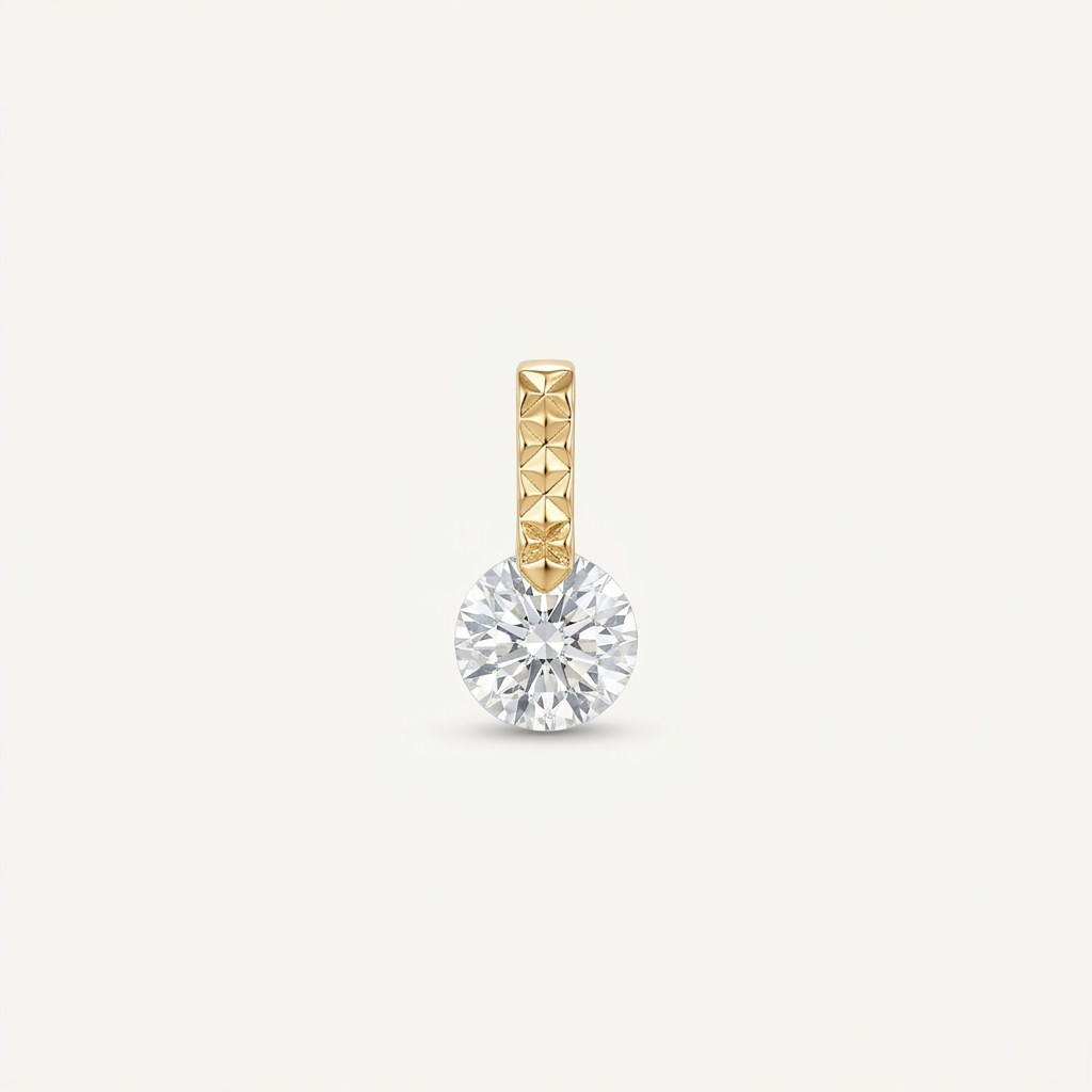 14K solid gold solitaire drop pendant on a warm ivory background