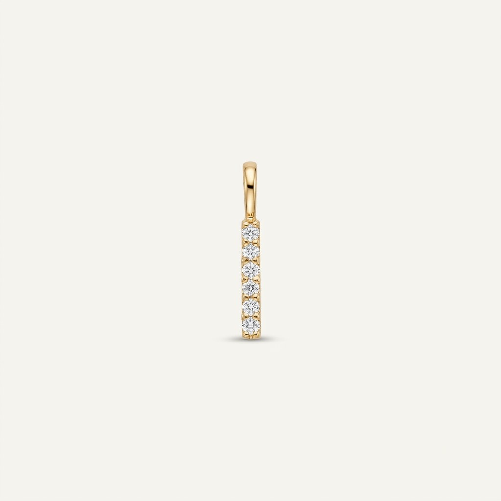 14K solid gold pavé bar pendant on a warm ivory background
