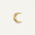 14K solid gold sculpted crescent moon pendant on a warm ivory background