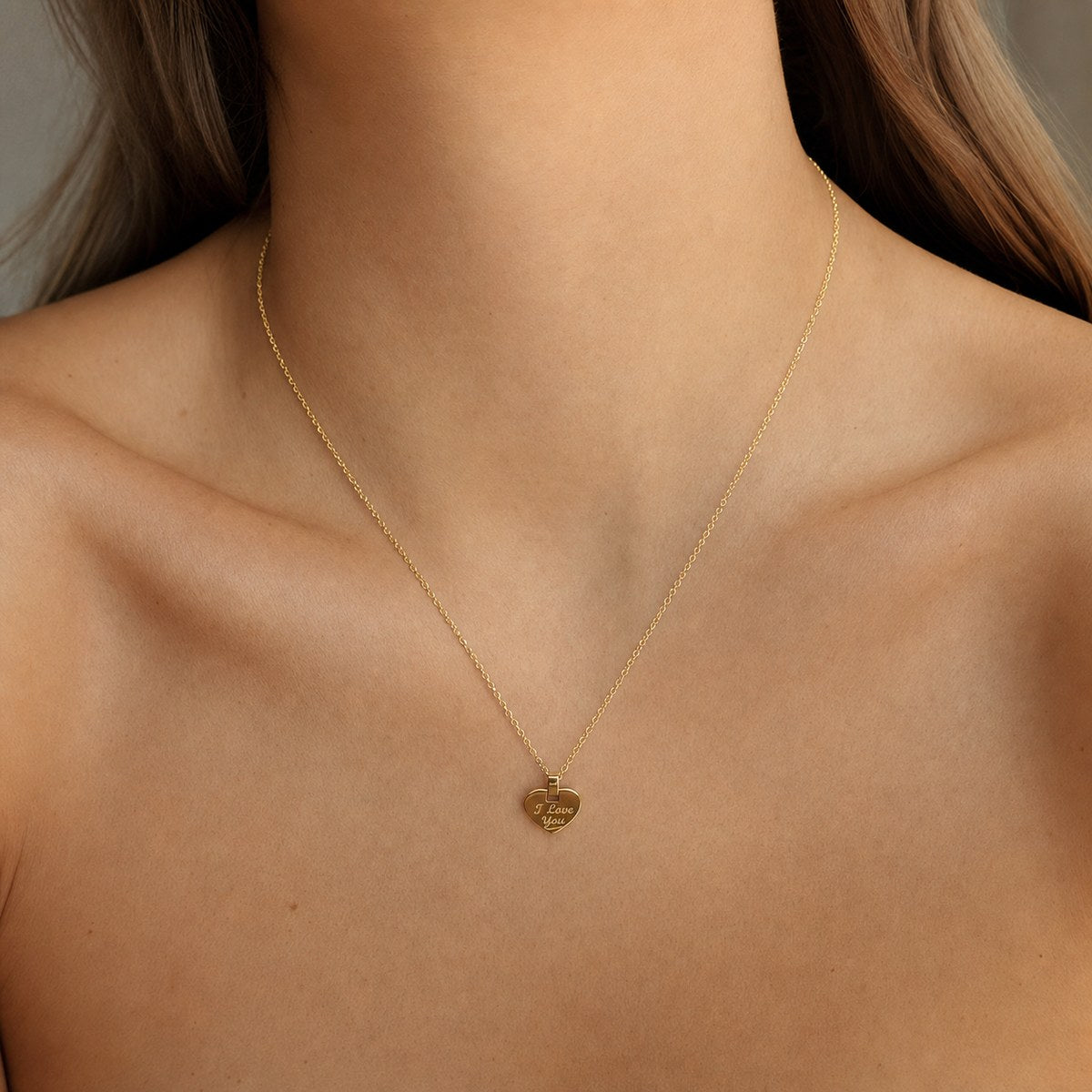 14K solid gold i love you heart pendant worn on a fine chain