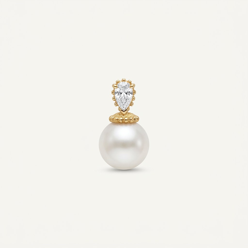 14K solid gold pearlescent drop pendant on a warm ivory background