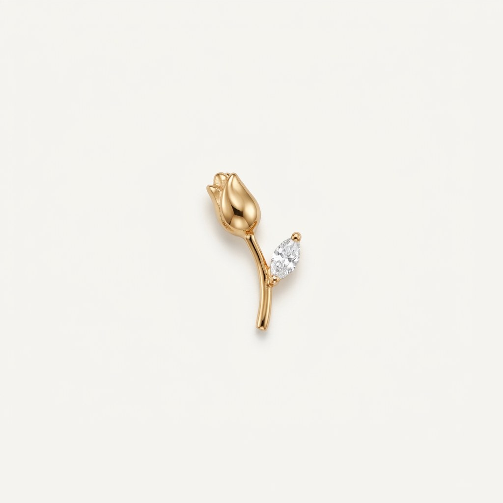 14K solid gold rosebud pendant on a warm ivory background