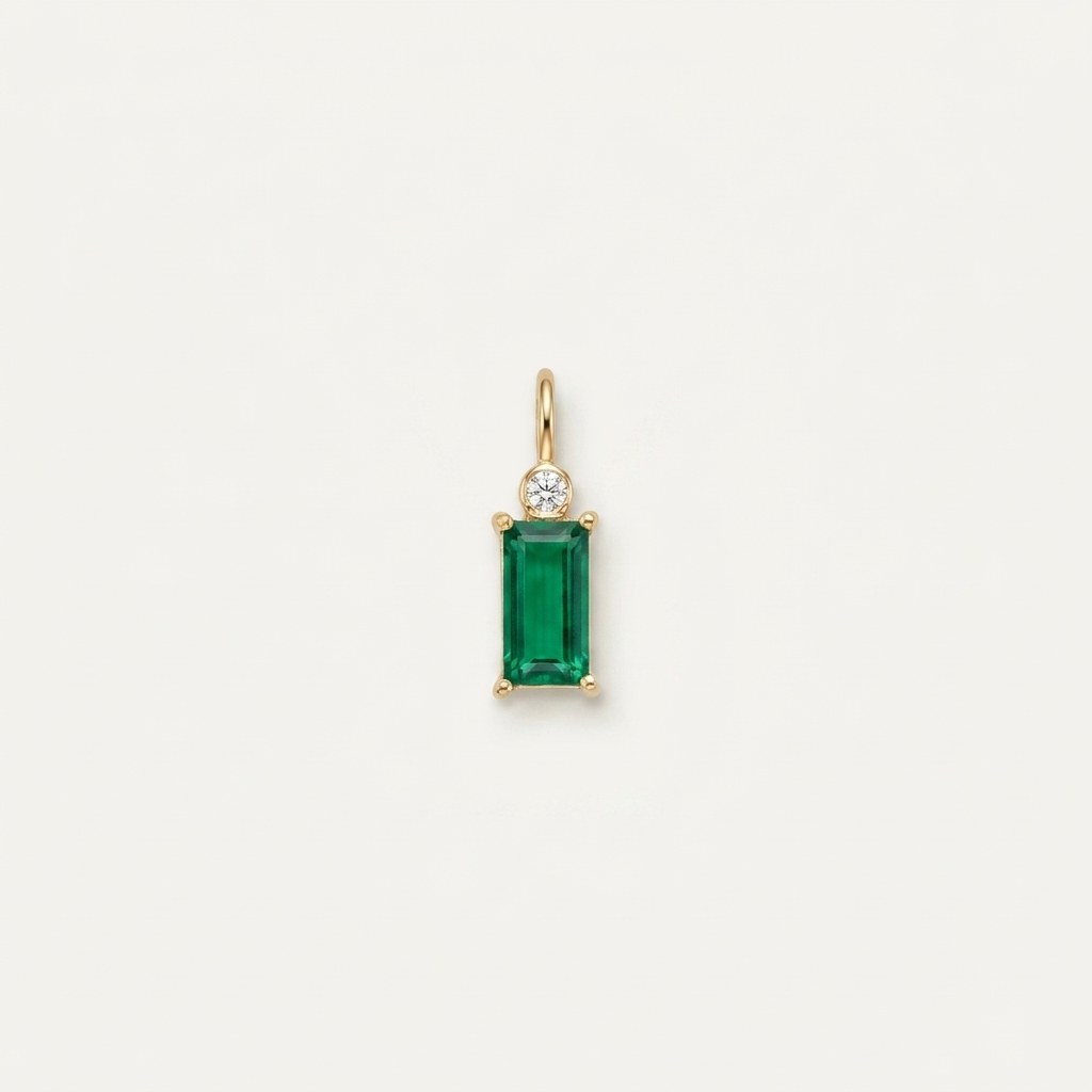 14K solid gold green rectangular stone pendant on a warm ivory background