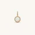 14K solid gold opalescent round halo pendant on a warm ivory background