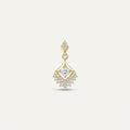 14K solid gold ornate kite pendant on a warm ivory background