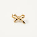 14K solid gold ribbon bow pendant on a warm ivory background