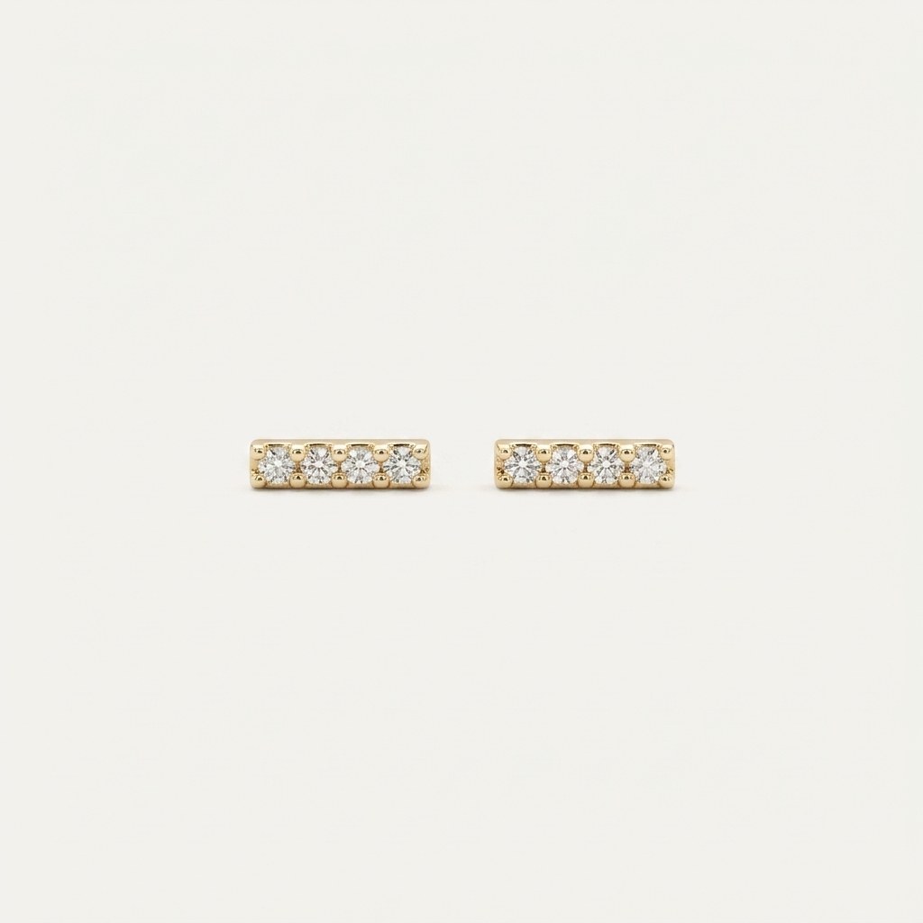 14K solid gold stone-set stud earrings on a warm ivory background