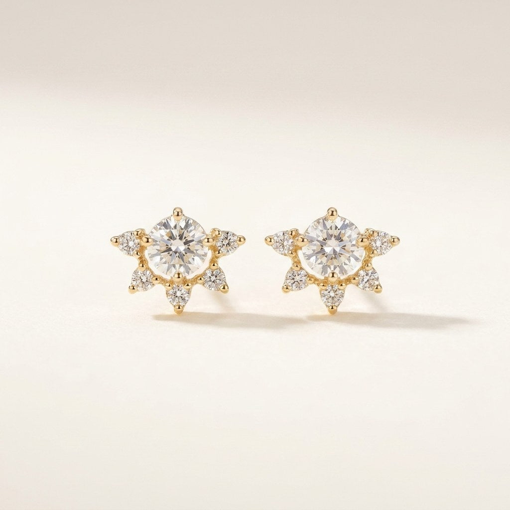 14K solid gold stone-set stud earrings on a warm ivory background