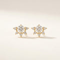 14K solid gold stone-set stud earrings on a warm ivory background