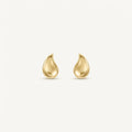 14K solid gold stud earrings on a warm ivory background