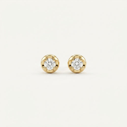 14K solid gold stone-set stud earrings on a warm ivory background