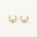 14K solid gold crystal antler stud earrings on a warm ivory background