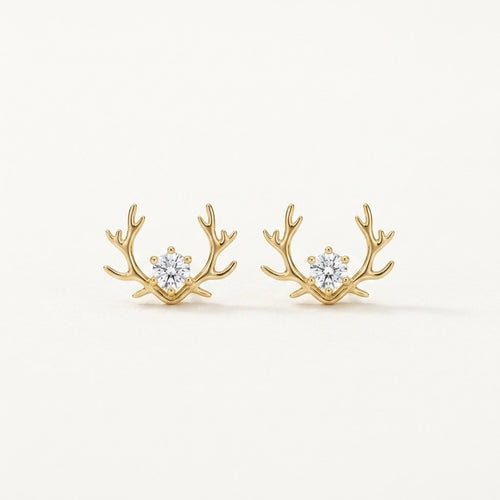 14K solid gold crystal antler stud earrings on a warm ivory background