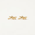 14K solid gold stud earrings on a warm ivory background