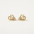 14K solid gold double heart stud earrings on a warm ivory background