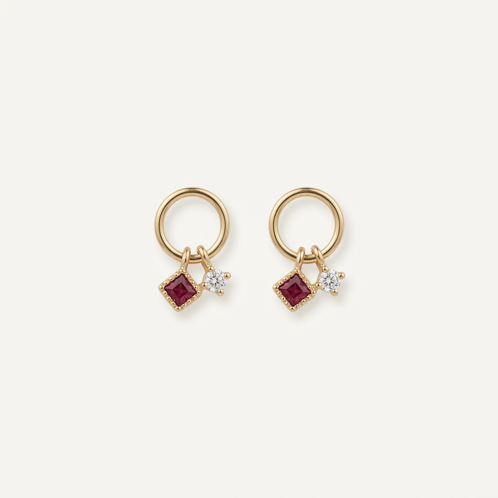 14K solid gold ruby circle drop stud earrings on a warm ivory background