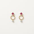 14K solid gold geometric circle drop stud earrings on a warm ivory background