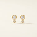 14K solid gold stone-set stud earrings on a warm ivory background